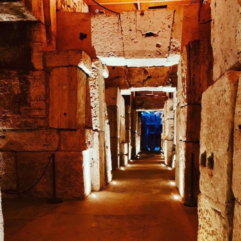 Colosseum at Night Inside the Colosseum Night time Orange Lighting Underground Tunnel