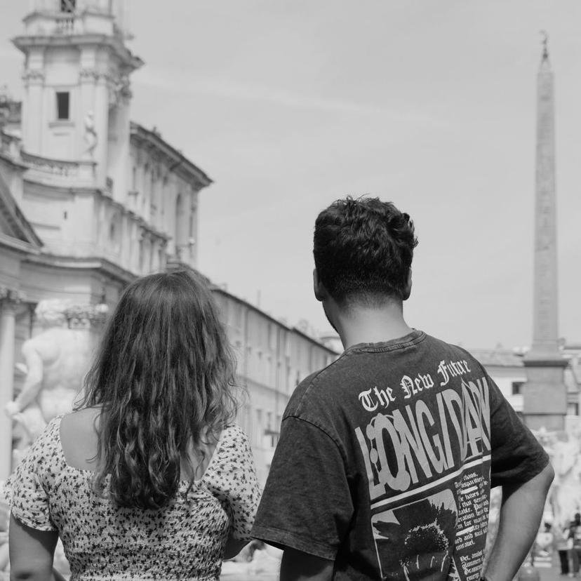 Couple enjoying Piazza Navona during a Dolce Vita stroll in Rome Couple exploring Piazza Navona on a Dolce Vita guided walking tour in Rome